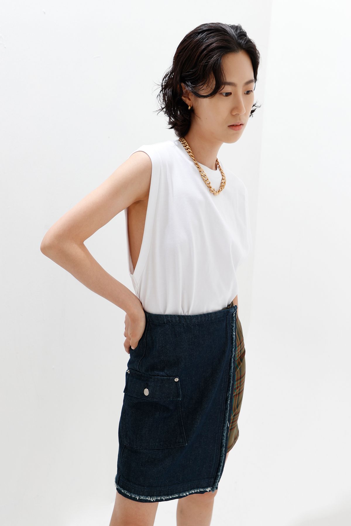 디메이든(DEMADEN) 크로스 오버 패치 스커트