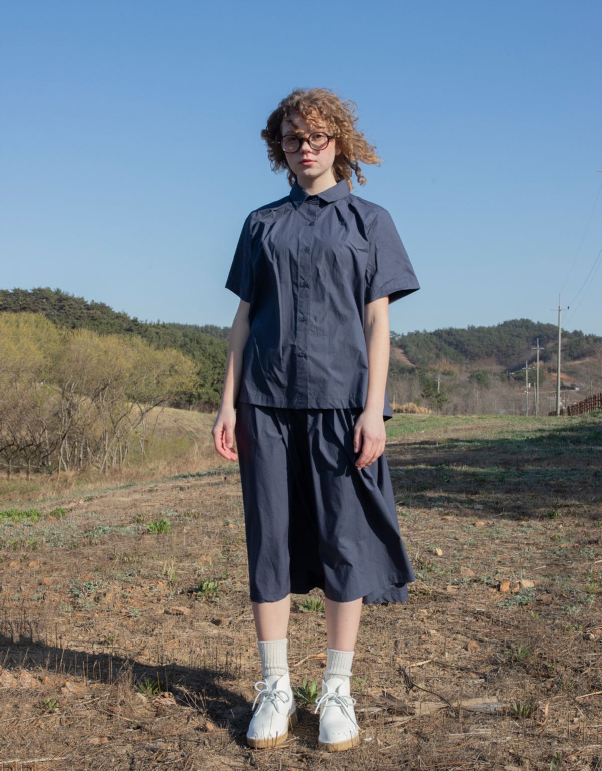 버나드밀즈(BERNARD MILLS) OBLONG PLEATED SKIRT - NAVY