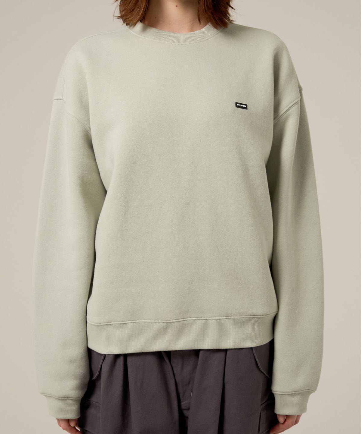 언리미트(UNLIMIT) Rubber Crewneck (U21DTTS51)