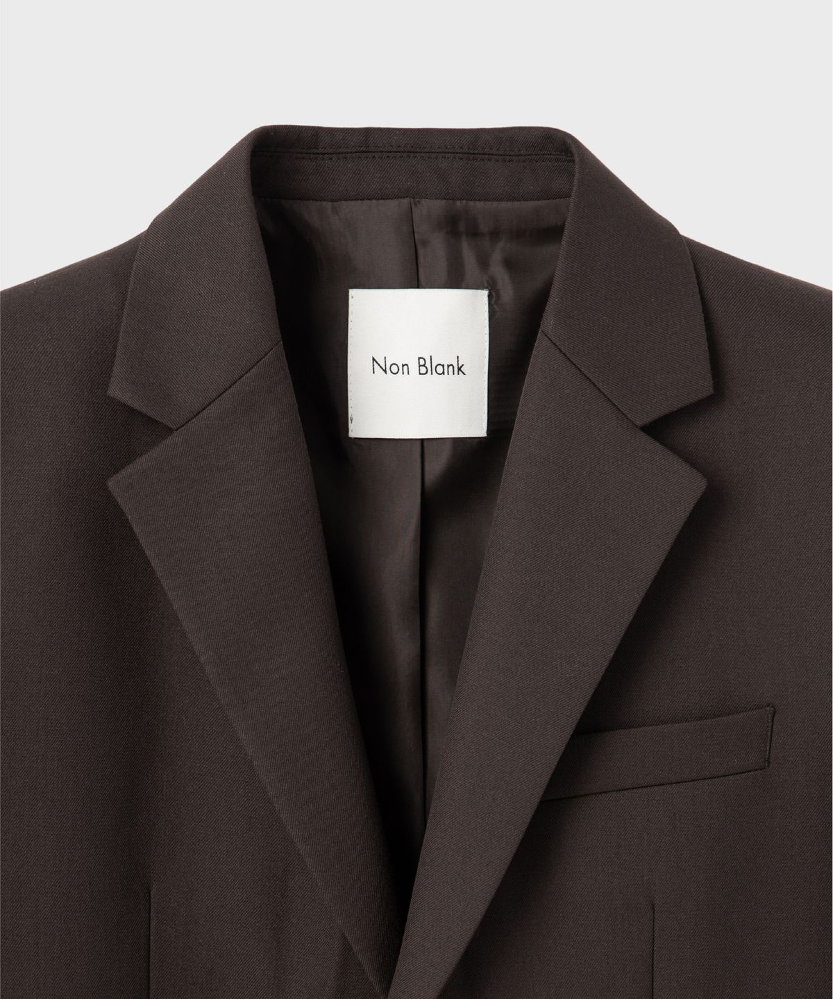넌블랭크(NONBLANK) 세미 오버사이즈 핏 블레이저_DARK BROWN