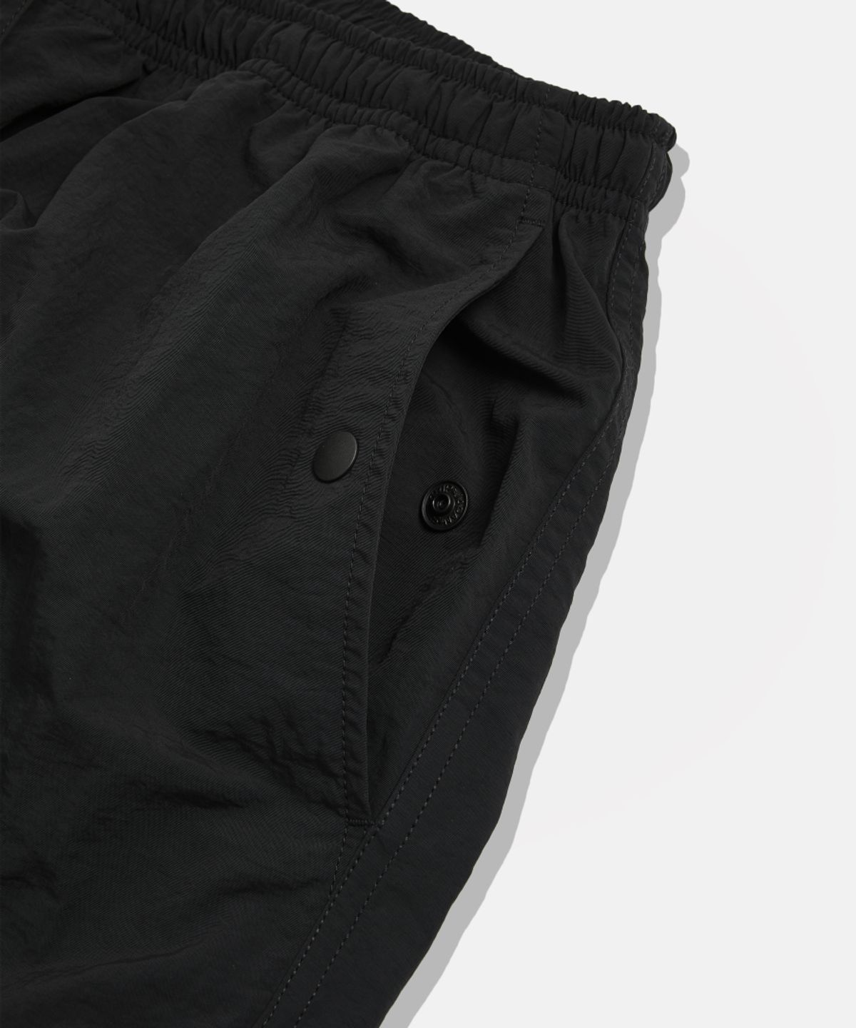 에스피오나지(ESPIONAGE) Nylon Warm Up Pants Black