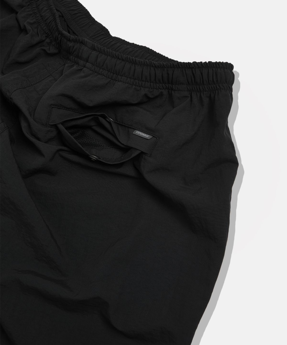 에스피오나지(ESPIONAGE) Nylon Warm Up Pants Black