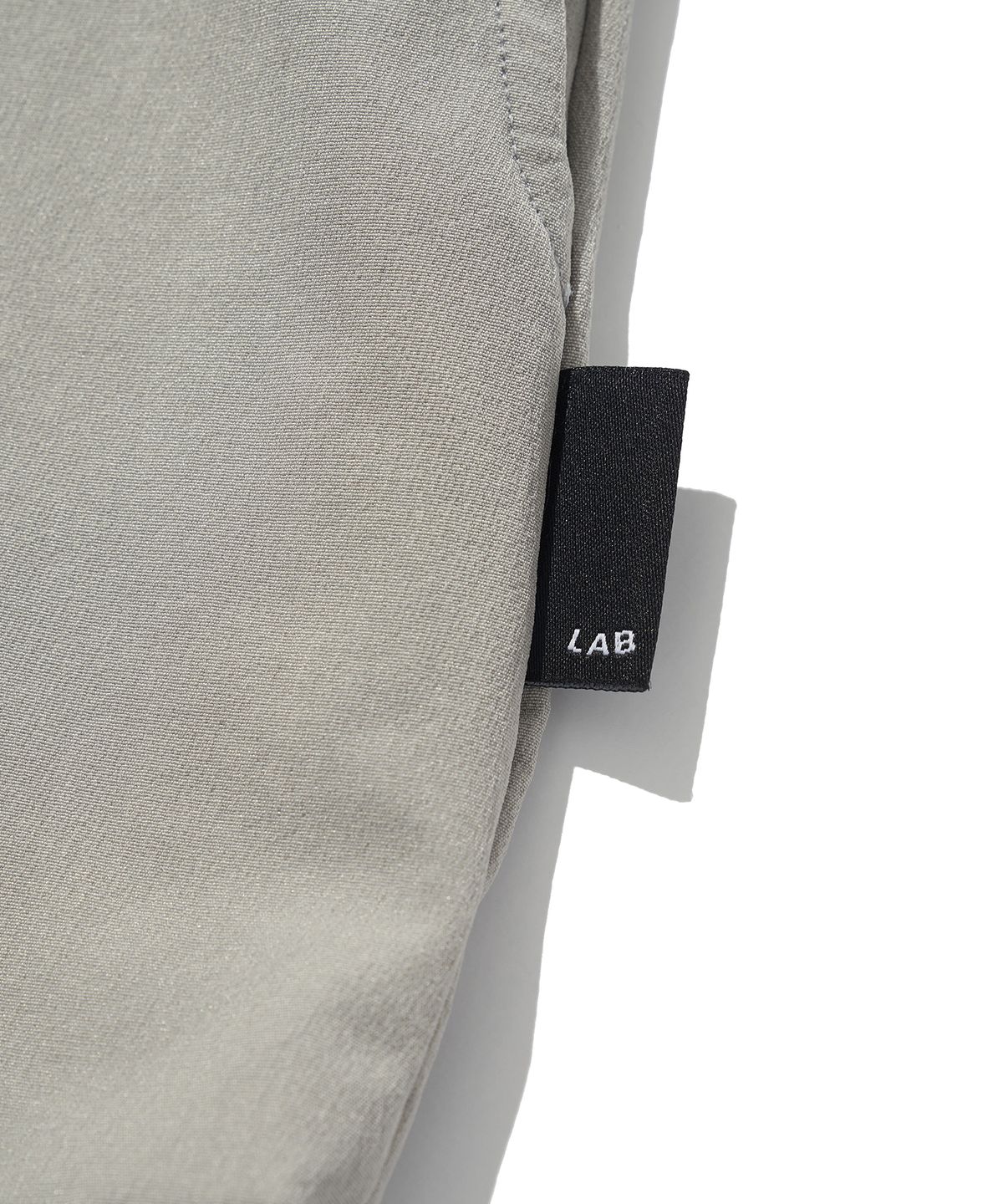 로우랩(RAW LAB) 나일론 RW 로고 폴로 (그레이)