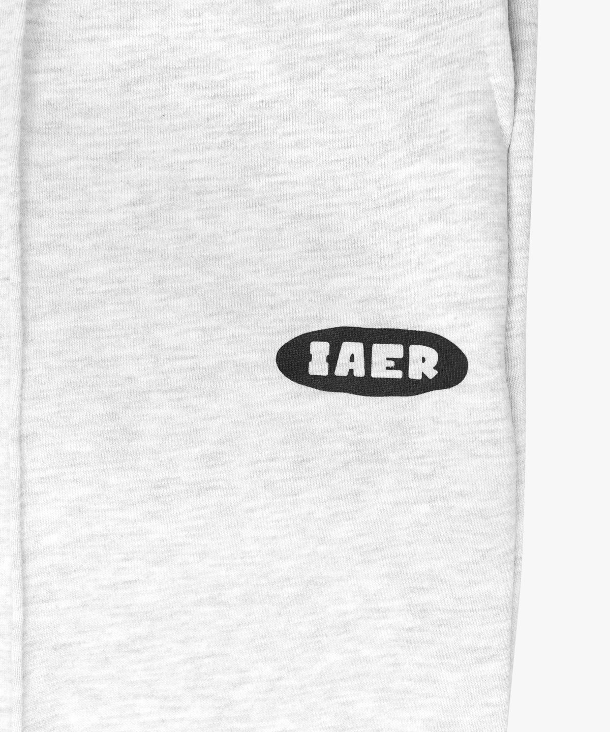 아이얼(IAER) 오발 로고 트레이닝 팬츠-멜란지 화이트