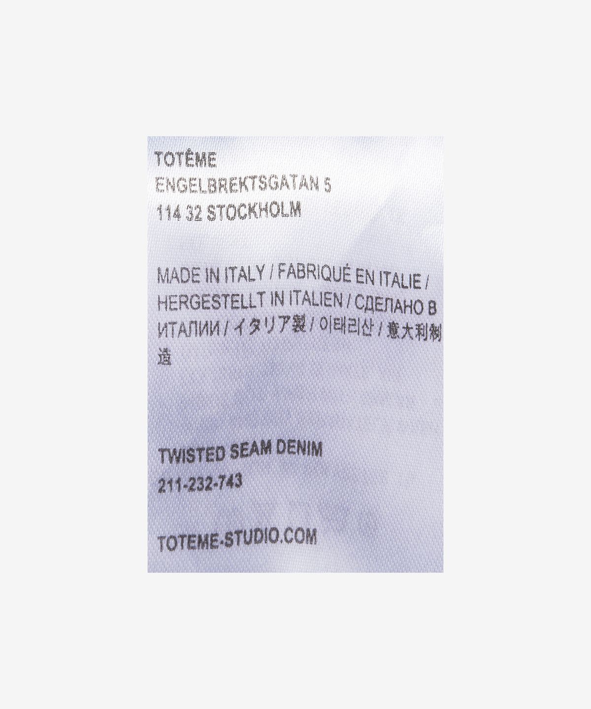 토템(TOTEME) 여성 트위스트 심 데님 팬츠 - 그레이 워시 / 211232743300