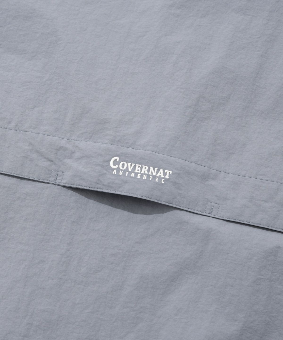 커버낫(COVERNAT) 윈드브레이커 점퍼 라이트 블루