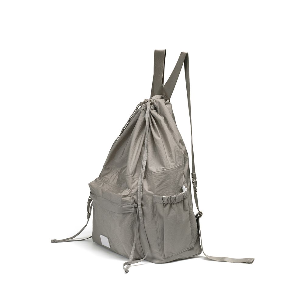 MUSINSA | fennec DRAWSTRING BACKPACK - GRAYISH BROWN