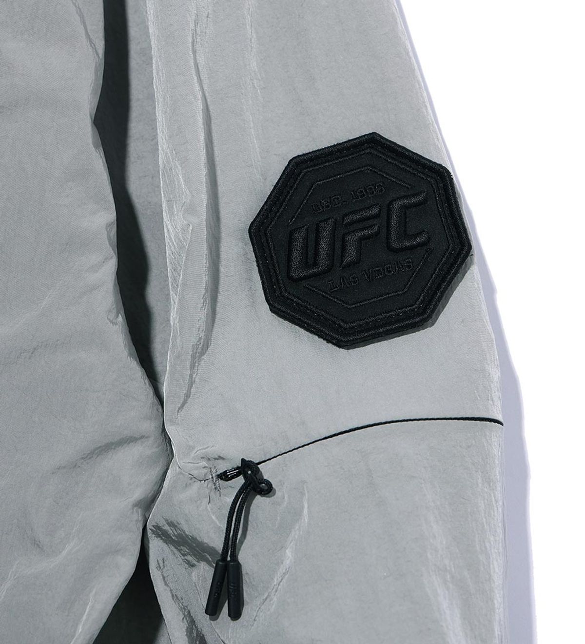 유에프씨 스포츠(UFC SPORT) UFC UT 글로스 봄버 자켓 라이트그레이 U1JKT1105LG