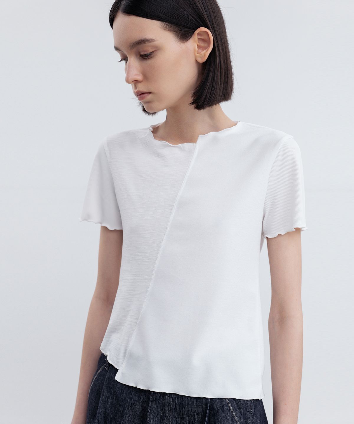 리이(RE RHEE) LETTUCE HEM ASYMMETRIC TOP