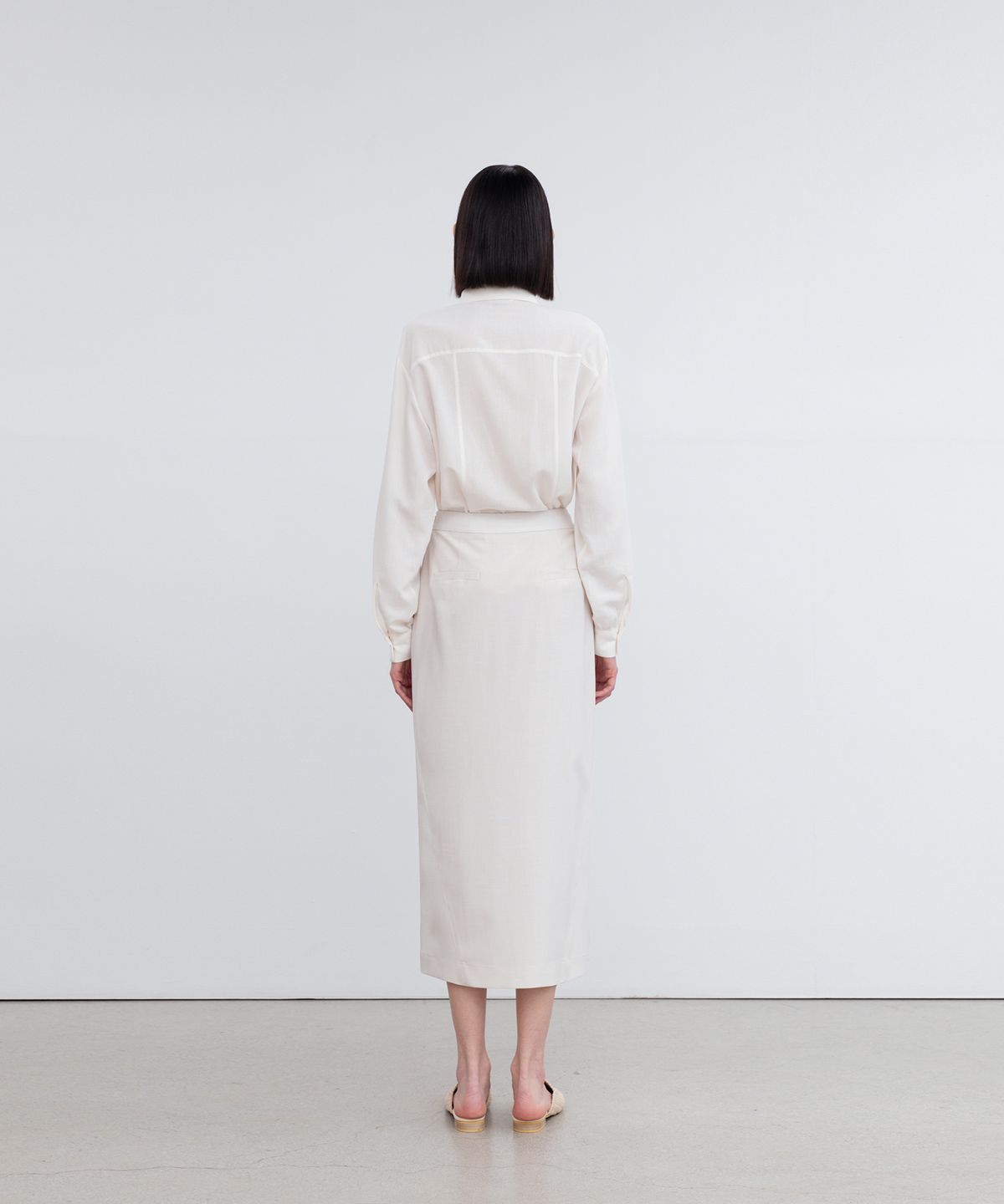리이(RE RHEE) LAYERED SIDE SLIT MIDI SKIRT