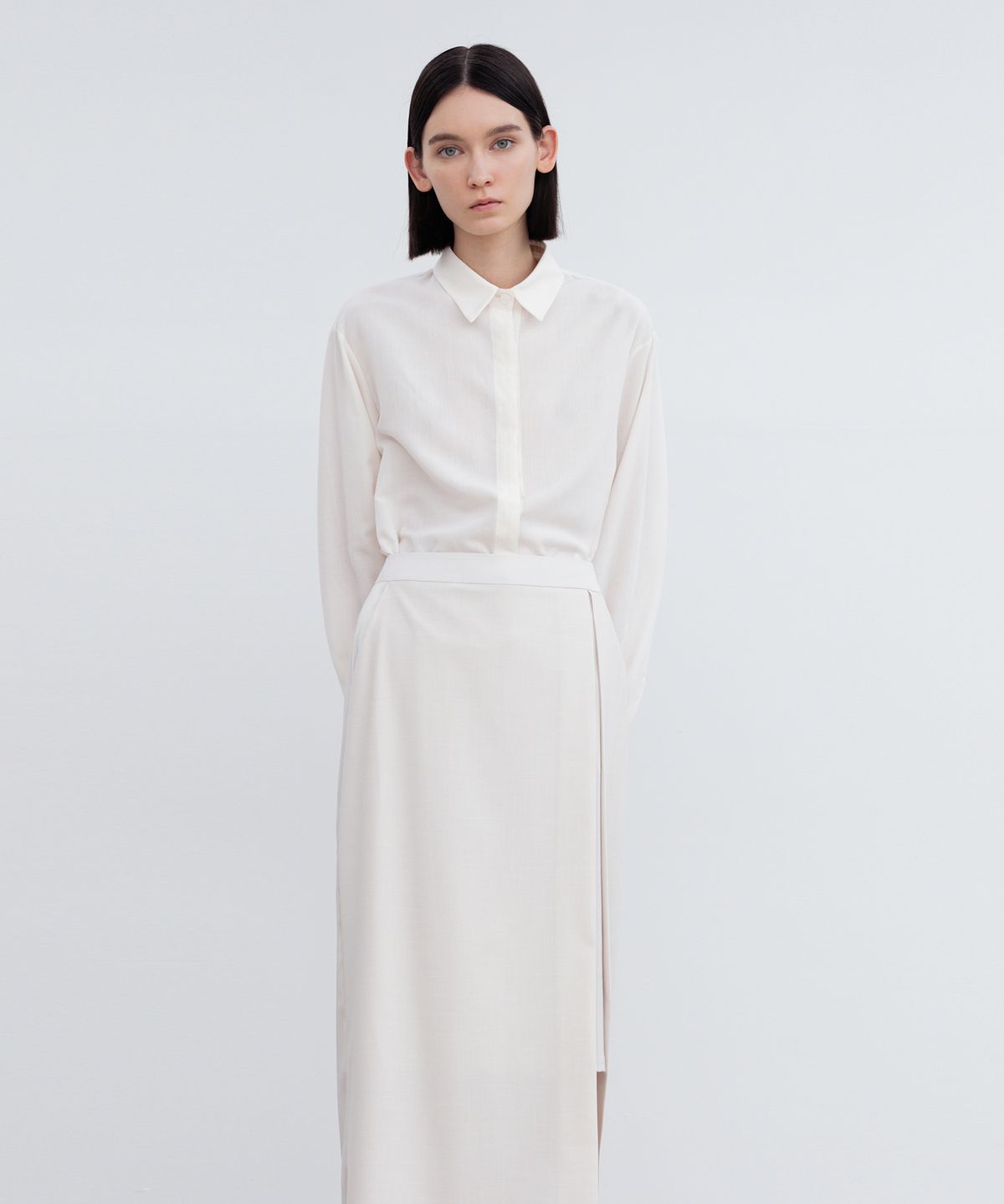리이(RE RHEE) LAYERED SIDE SLIT MIDI SKIRT