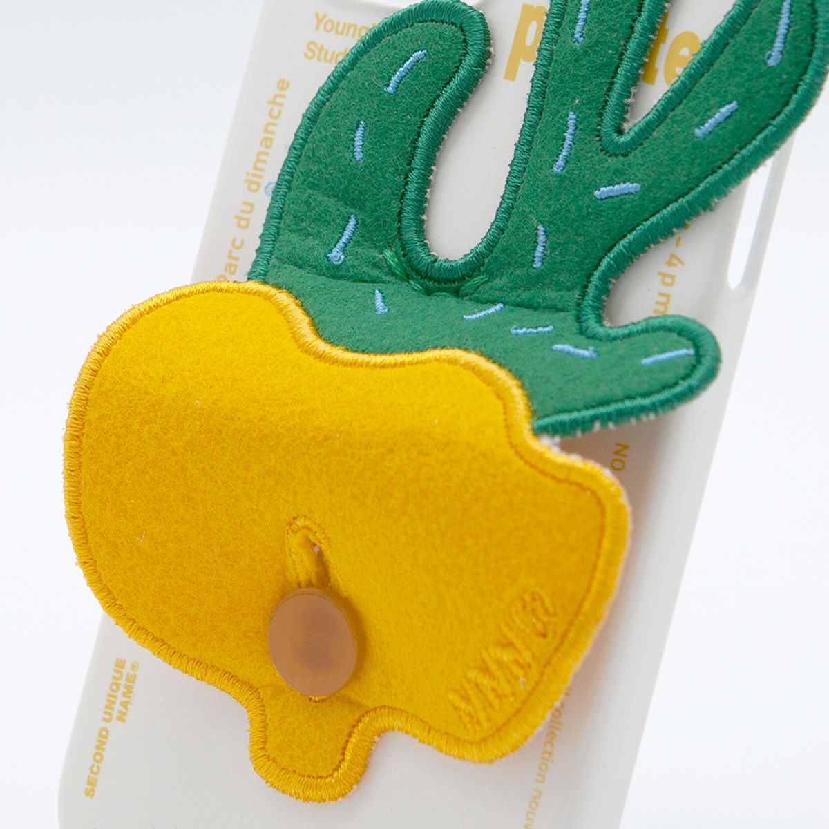세컨드유니크네임(SECOND UNIQUE NAME) SUN CASE PLANTS PATCH YELLOW