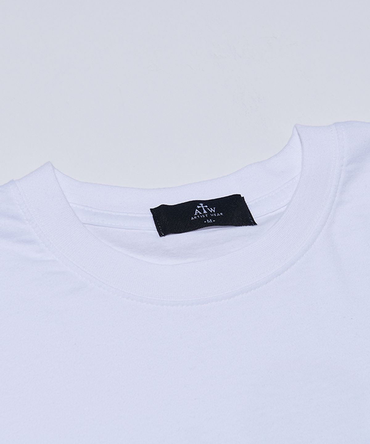 아티스트웨어(ARTISTWEAR) [ATW X COLLABO] 류시 해바라기 스마일 반팔티 WH