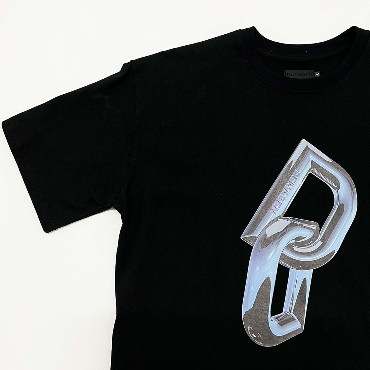 디메이든(DEMADEN) D RING GRAPHIC 1/2 T-SHIRT BLACK