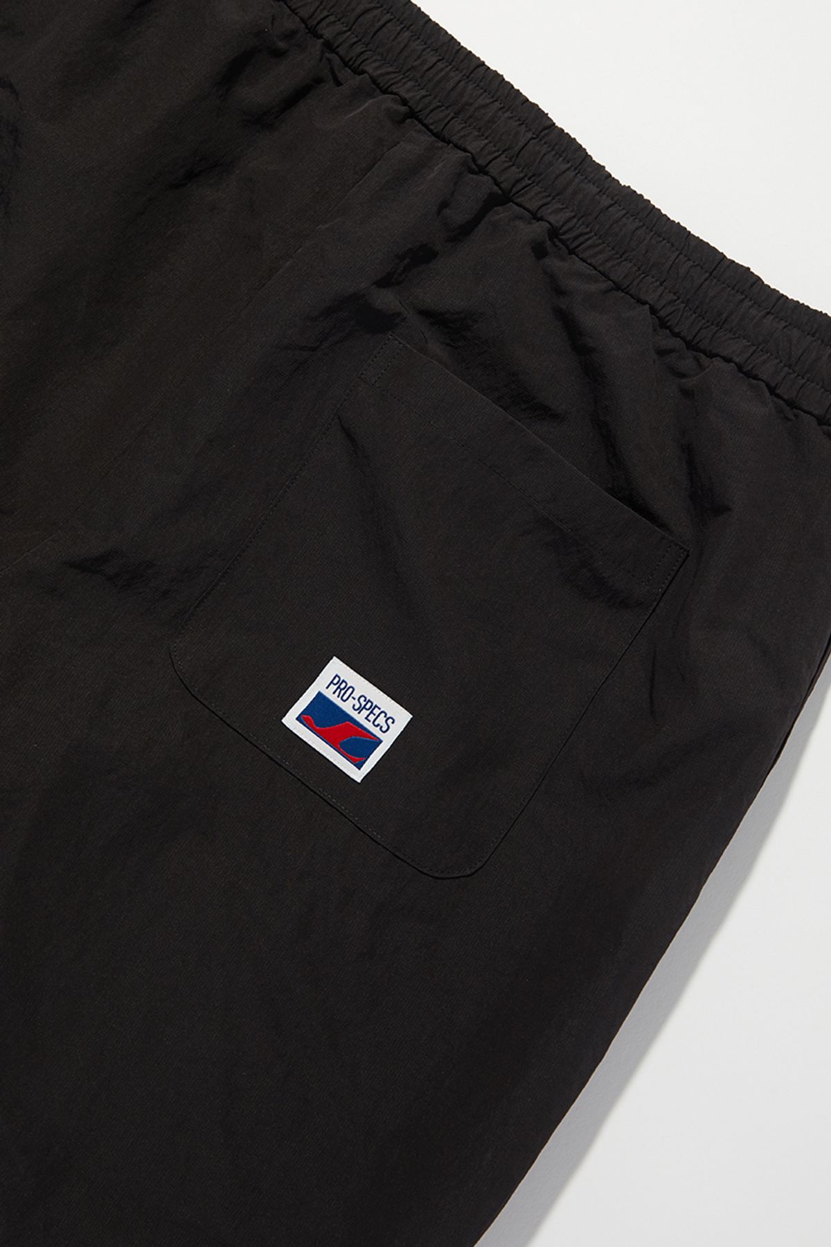 프로-스펙스(PRO-SPECS) BASIC OS LOGO NYLON SHORTS_BLACK