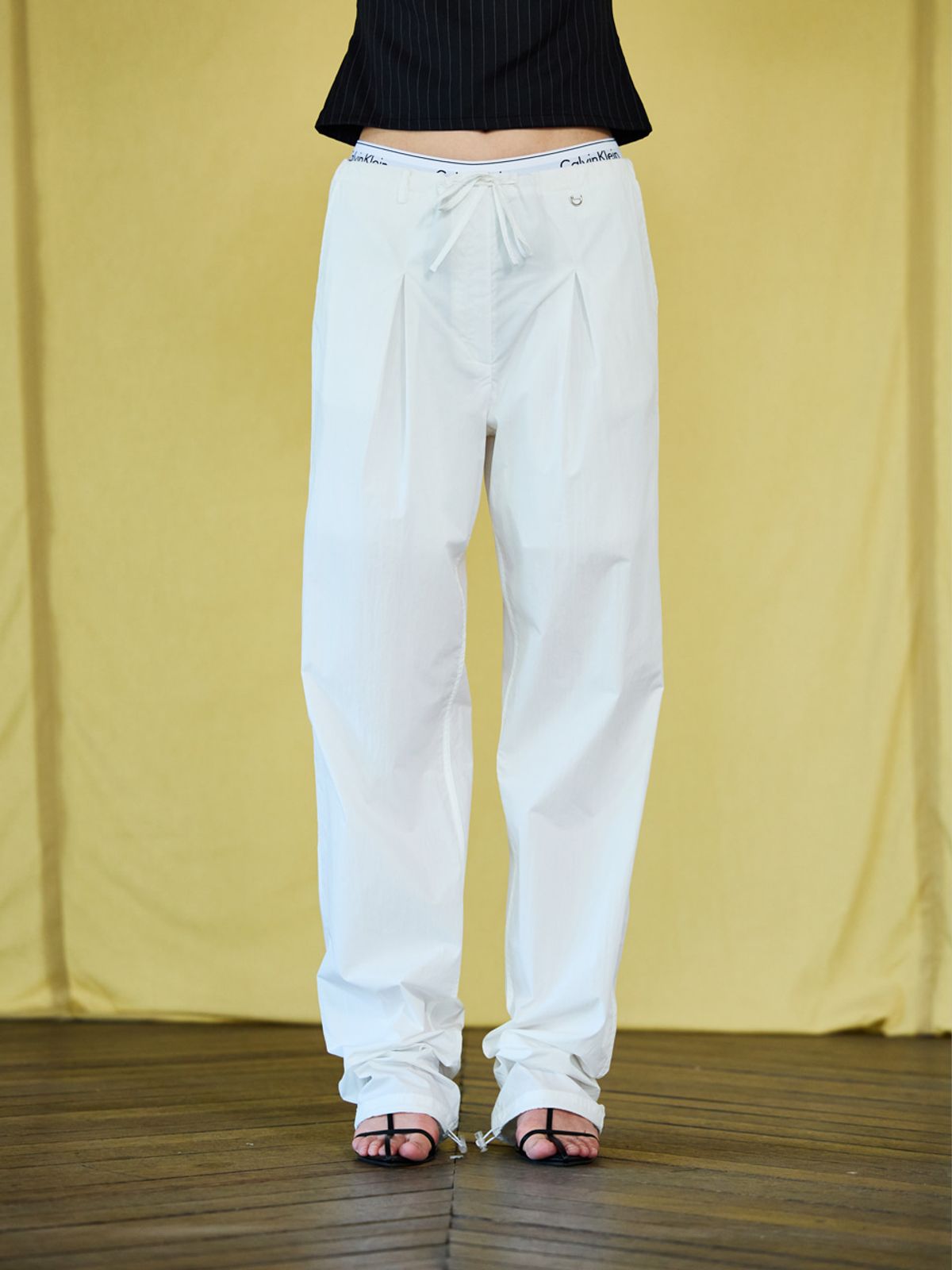 위메농(OUI MAIS NON) Colin low nylon slacks