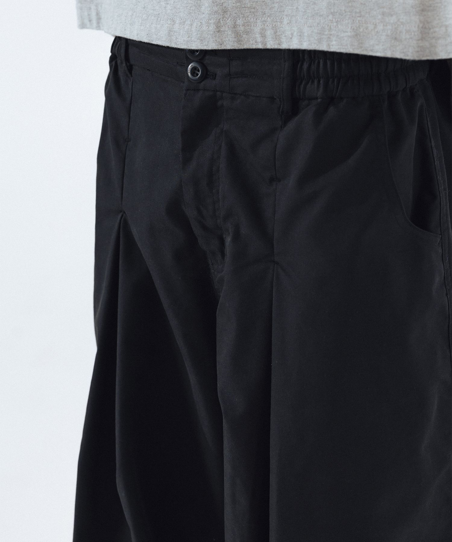 MUSINSA | ANGLAN Unbalance Long Tuck Balloon Pants - Black