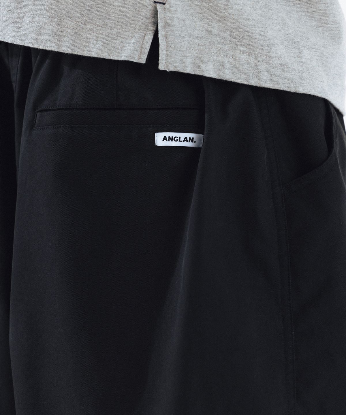 앵글런(ANGLAN) Unbalance Long Tuck Balloon Pants - Black