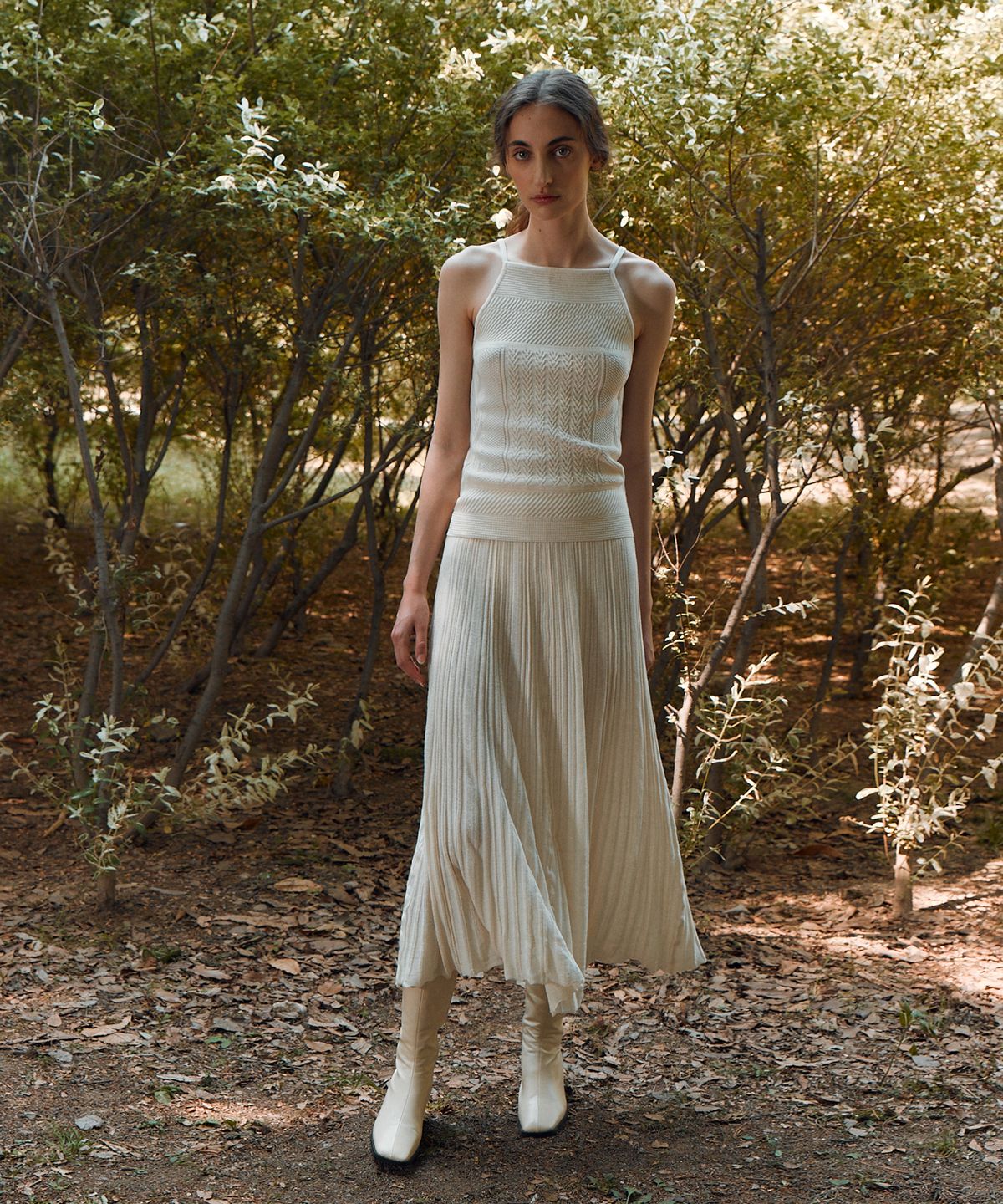 리이(RE RHEE) KNITTED PLEATS MIDI SKIRT CREAM