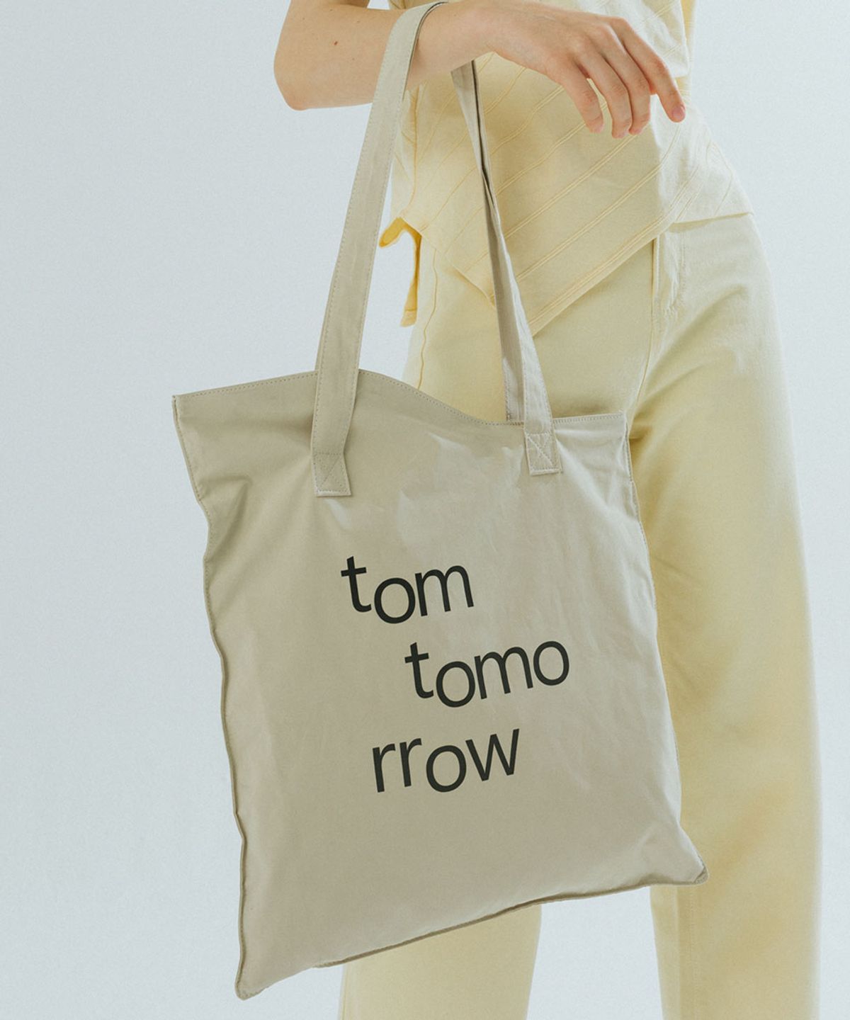 톰투머로우(TOMTOMORROW) wave logo bag [beige]