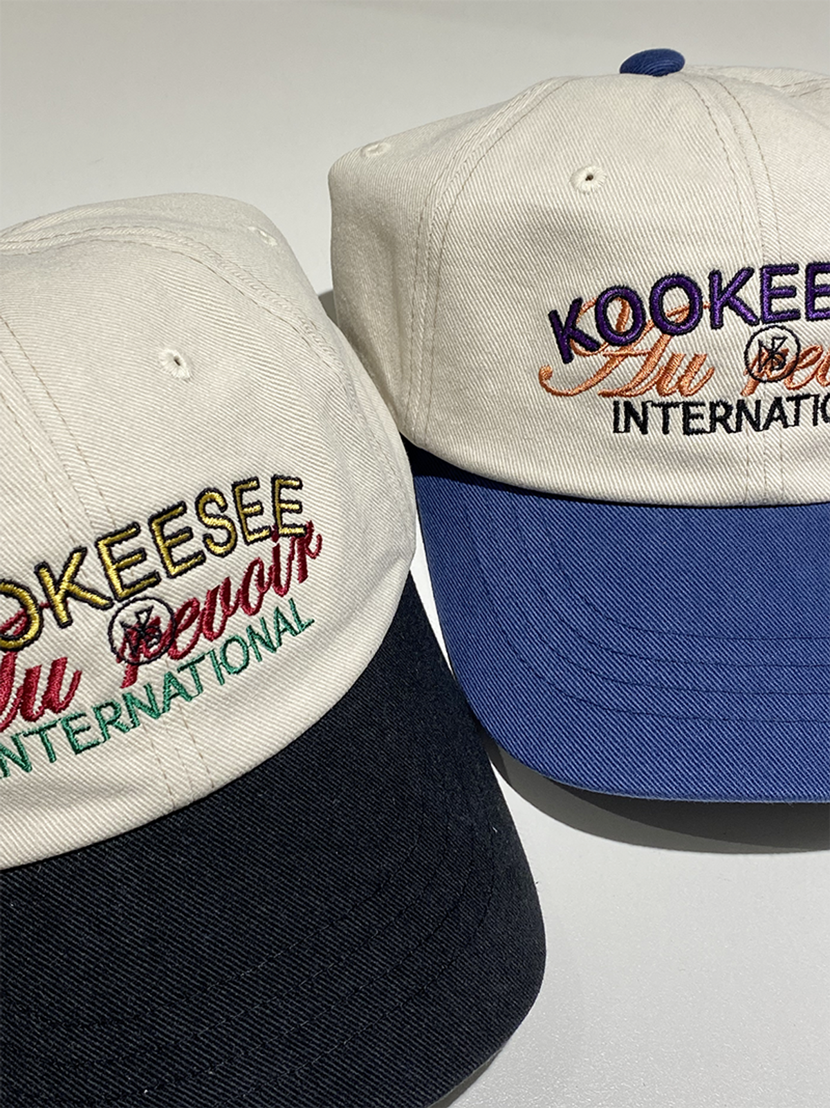 쿠키시(KOOKEESEE) 투톤배색 빈티지 워싱 자수 볼캡  (연베이지/블랙)