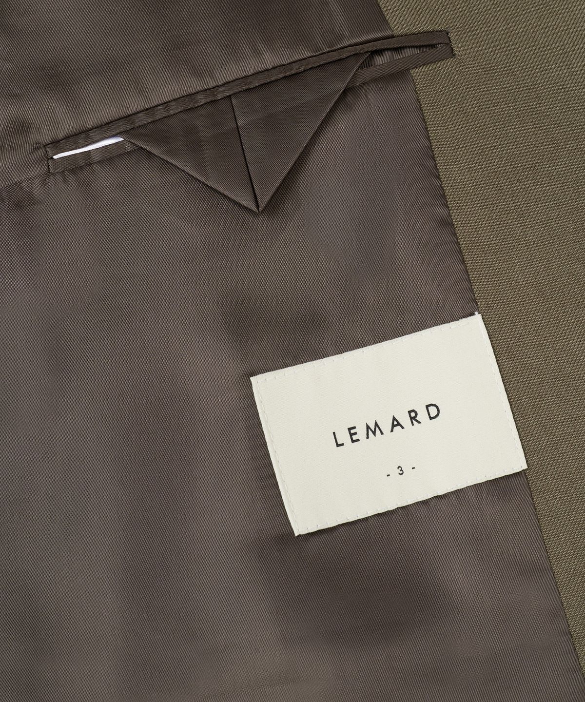 르마드(LEMARD) 오버핏 언발 단추 디테일 셋업자켓 - 올리브