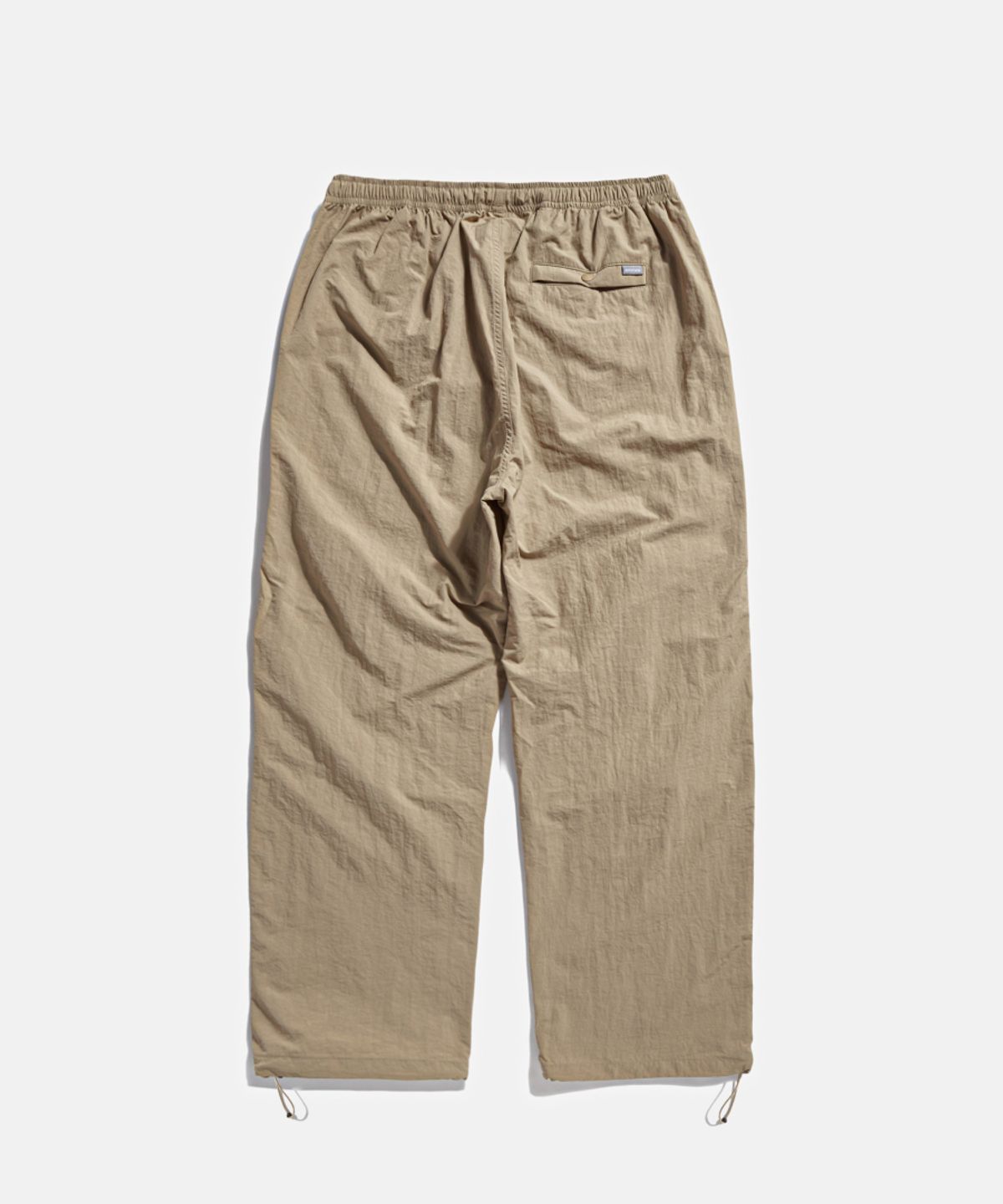 에스피오나지(ESPIONAGE) Nylon Warm Up Pants Desert