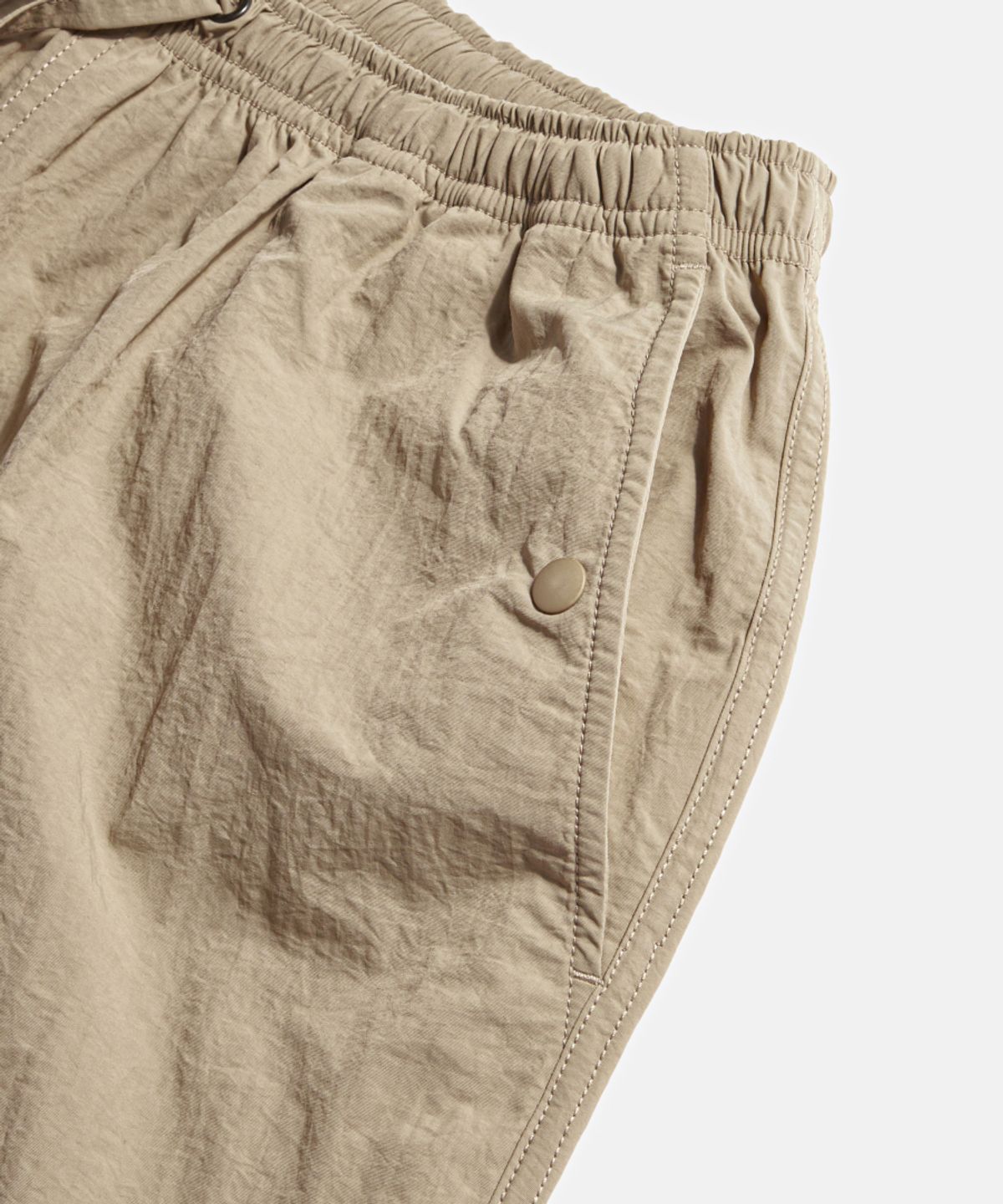 에스피오나지(ESPIONAGE) Nylon Warm Up Pants Desert