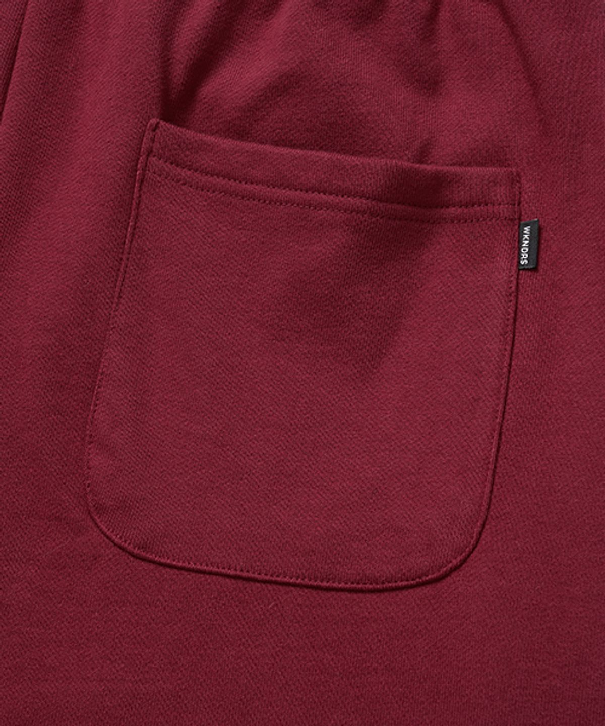 위캔더스(WKNDRS) KELLOGGS SWEAT PANTS (RED)