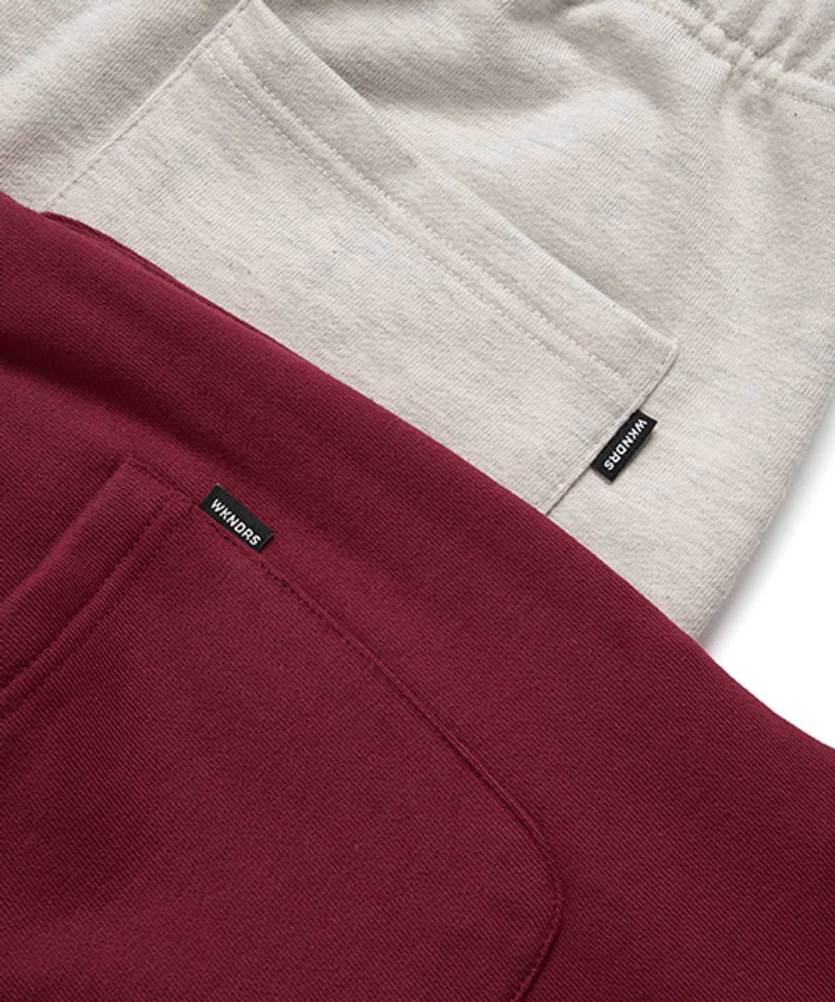 위캔더스(WKNDRS) KELLOGGS SWEAT PANTS (RED)