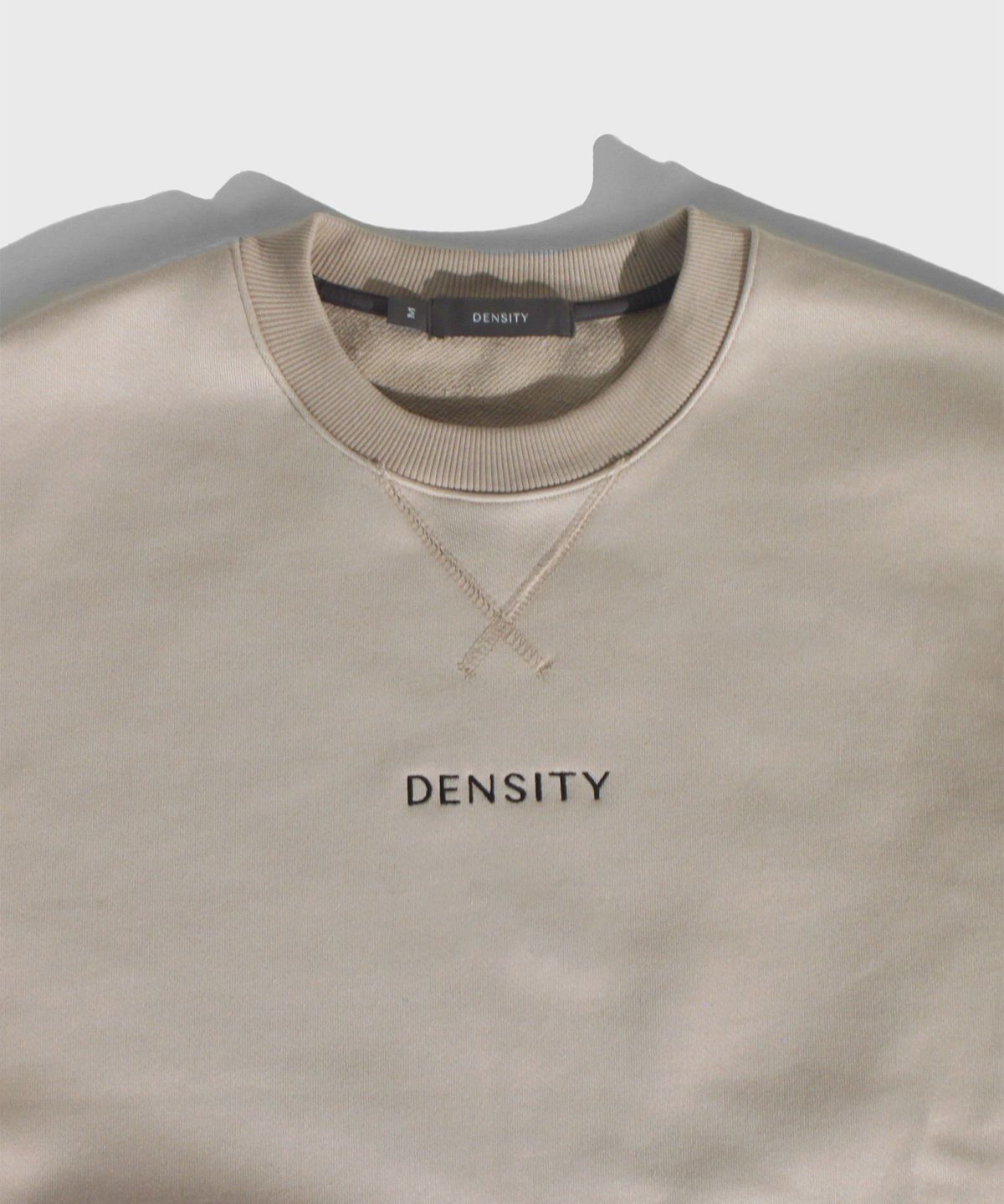 덴시티(DENSITY) 로고타입 스웻셔츠_라이트 베이지