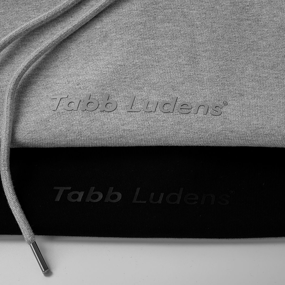 탭루덴스(TABBLUDENS) Basic TL Logo Hoodie