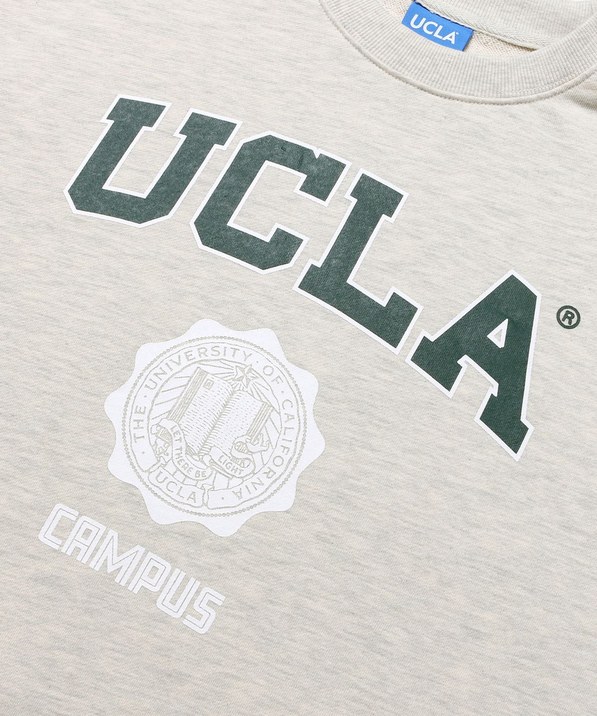 유씨엘에이(UCLA) 로고 씰 스웨트셔츠 [Oatmeal](UY9LT10_24)