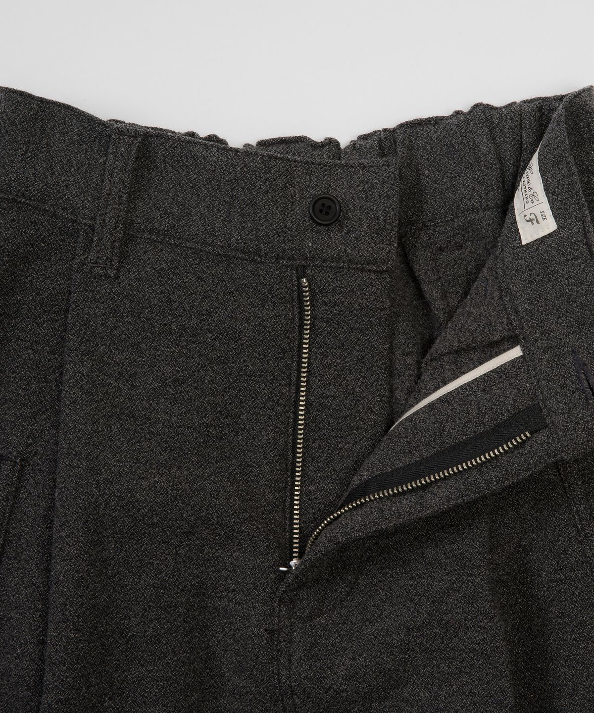 코튼벨(COTTON BELL) 아웃포켓 울스커트 - Wool Charcoal
