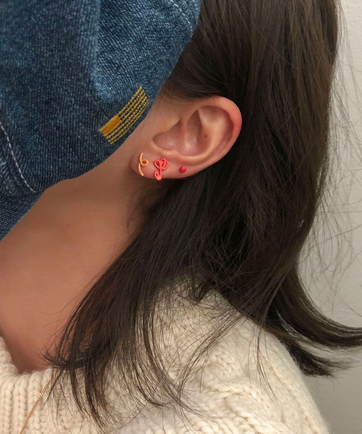 잇더즌매터(IT DOESN'T MATTER) Rainbow doodle piercing (Orange)