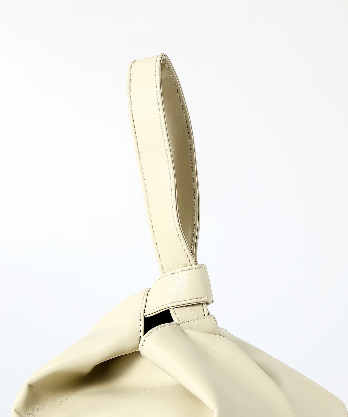 옐로우스톤(YELLOWSTONE) Dumpling wrist bag - Ivory