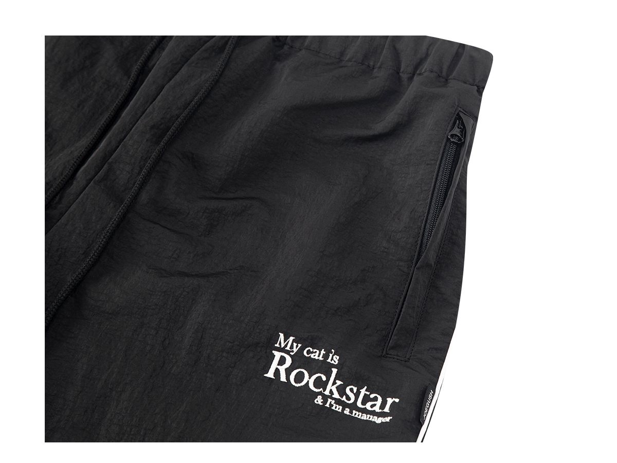 조거쉬(JOEGUSH) My cat is Rockstar Nylon Track pants (Black)