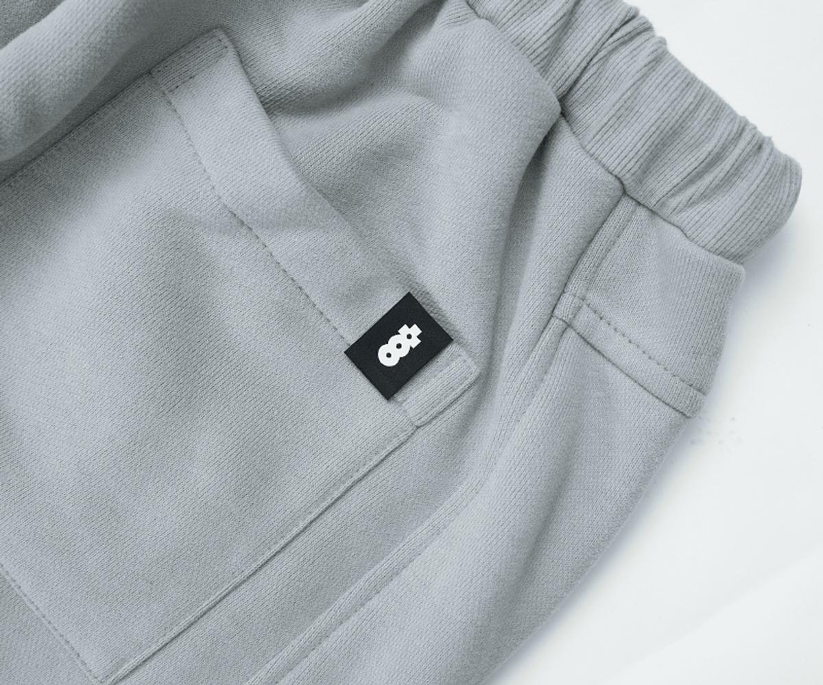 아웃 오브 트렁크(OUT OF TRUNK) Character Sweatpants (Light Grey)