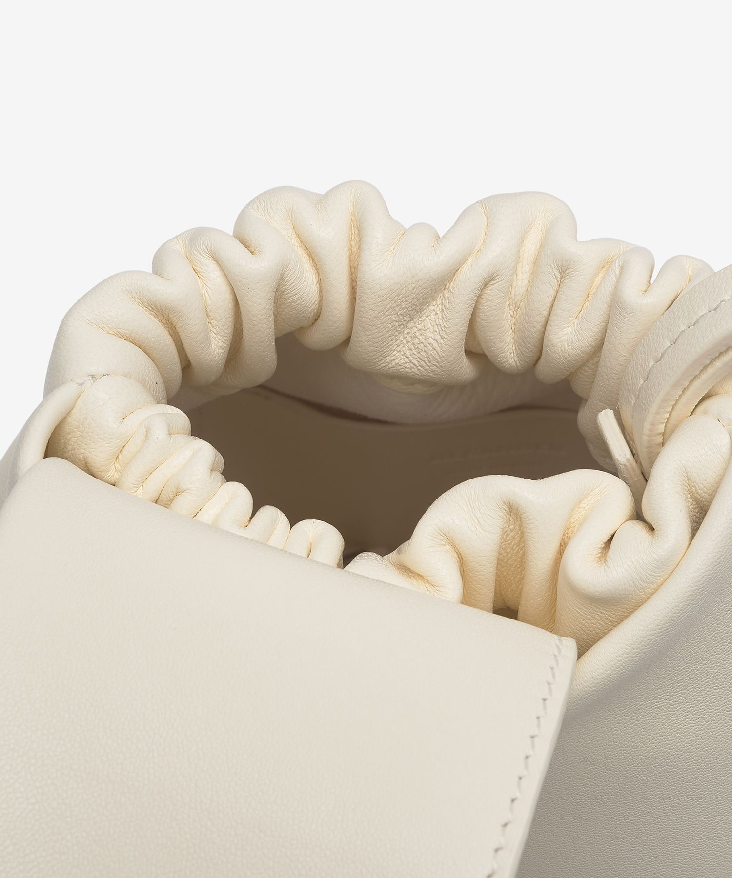 MUSINSA | JIL SANDER Bow pouch bag - Off-White