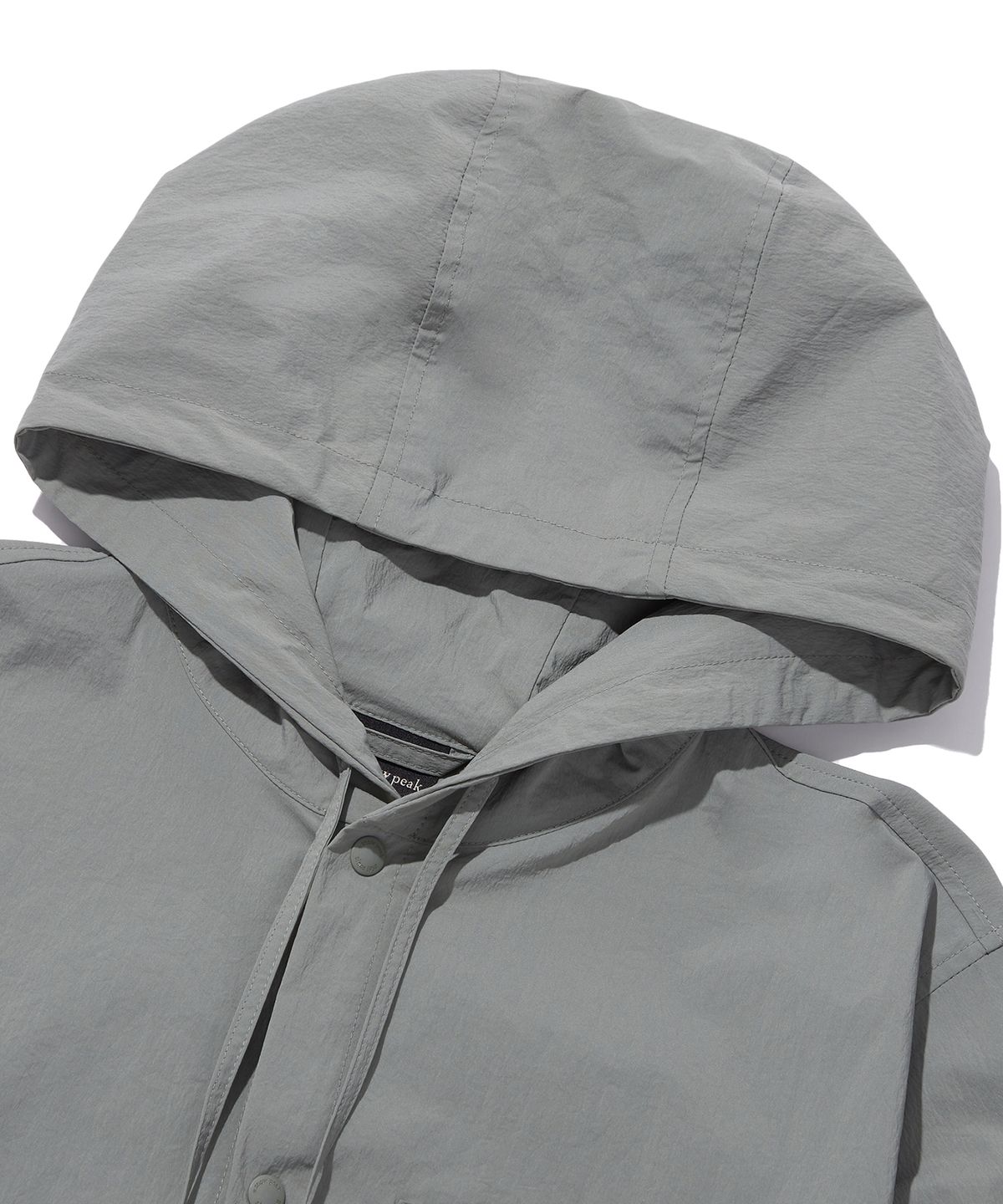 스노우피크 어패럴(SNOWPEAK APPAREL) 루트 썬그립 바람막이 Light Khaki (S23MURWB22)