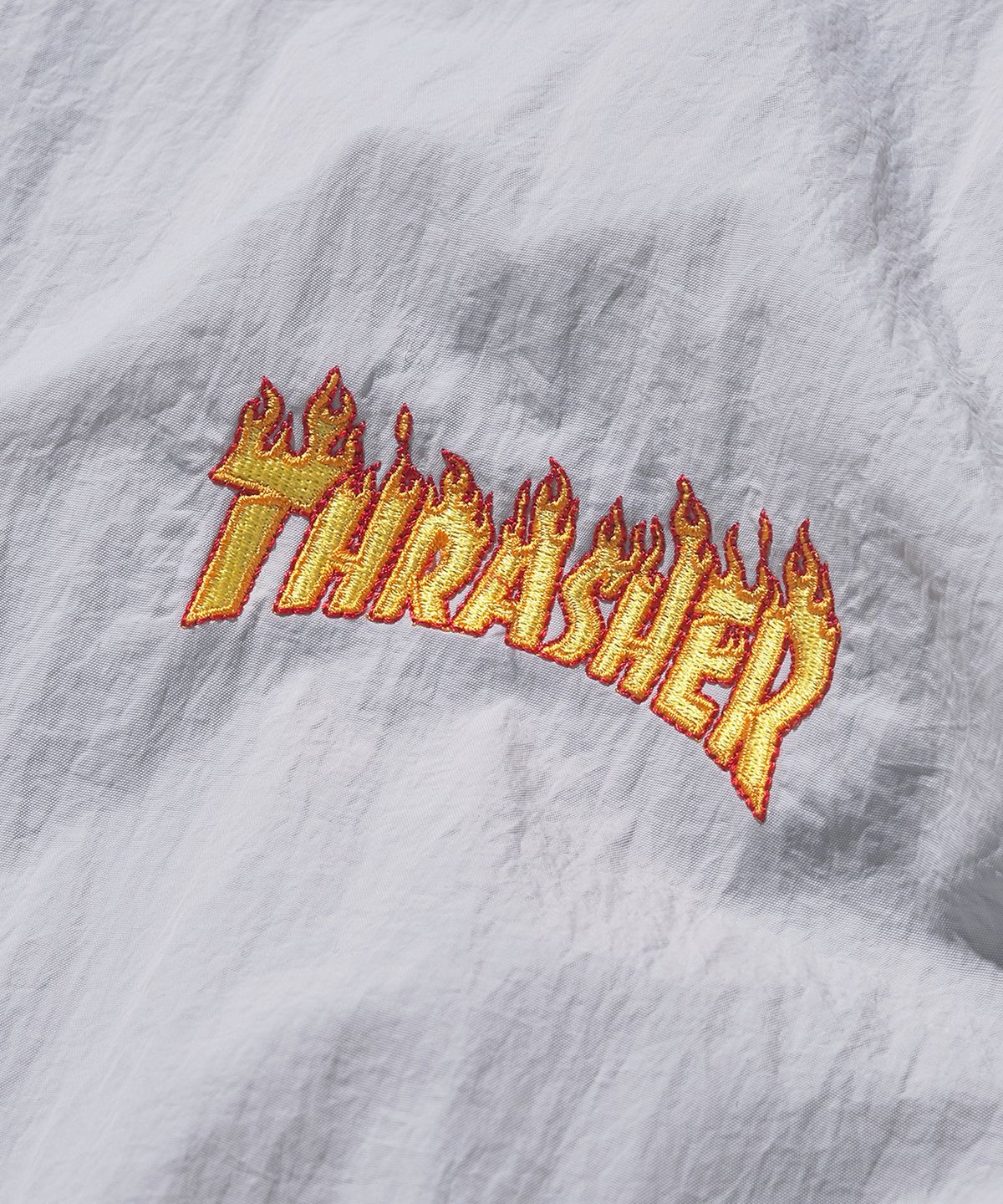 트레셔(THRASHER) 플레임 나일론 아노락 자켓 라이트 그레이