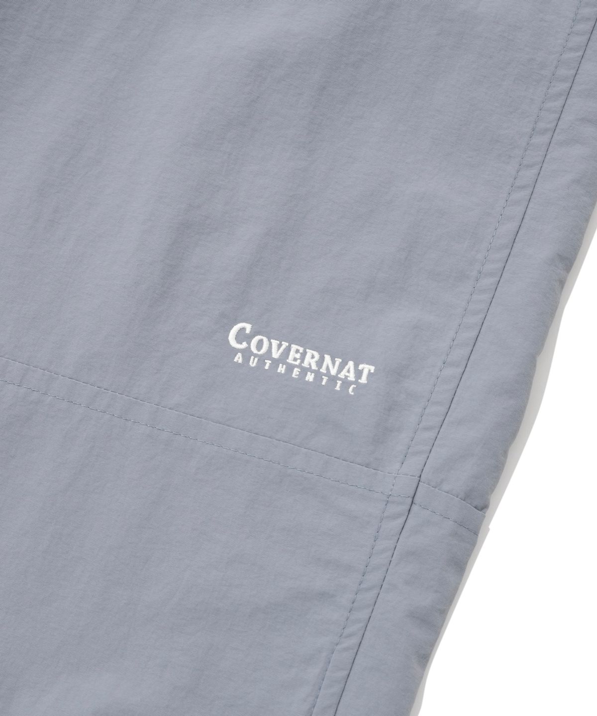 커버낫(COVERNAT) 윈드브레이커 조거 팬츠 라이트 블루