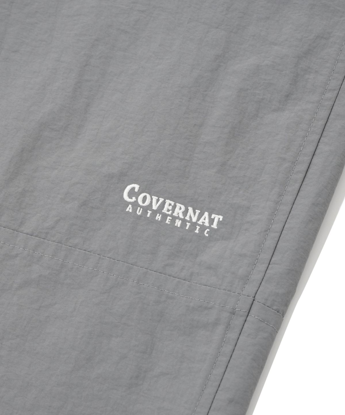 커버낫(COVERNAT) 윈드브레이커 조거 팬츠 그레이