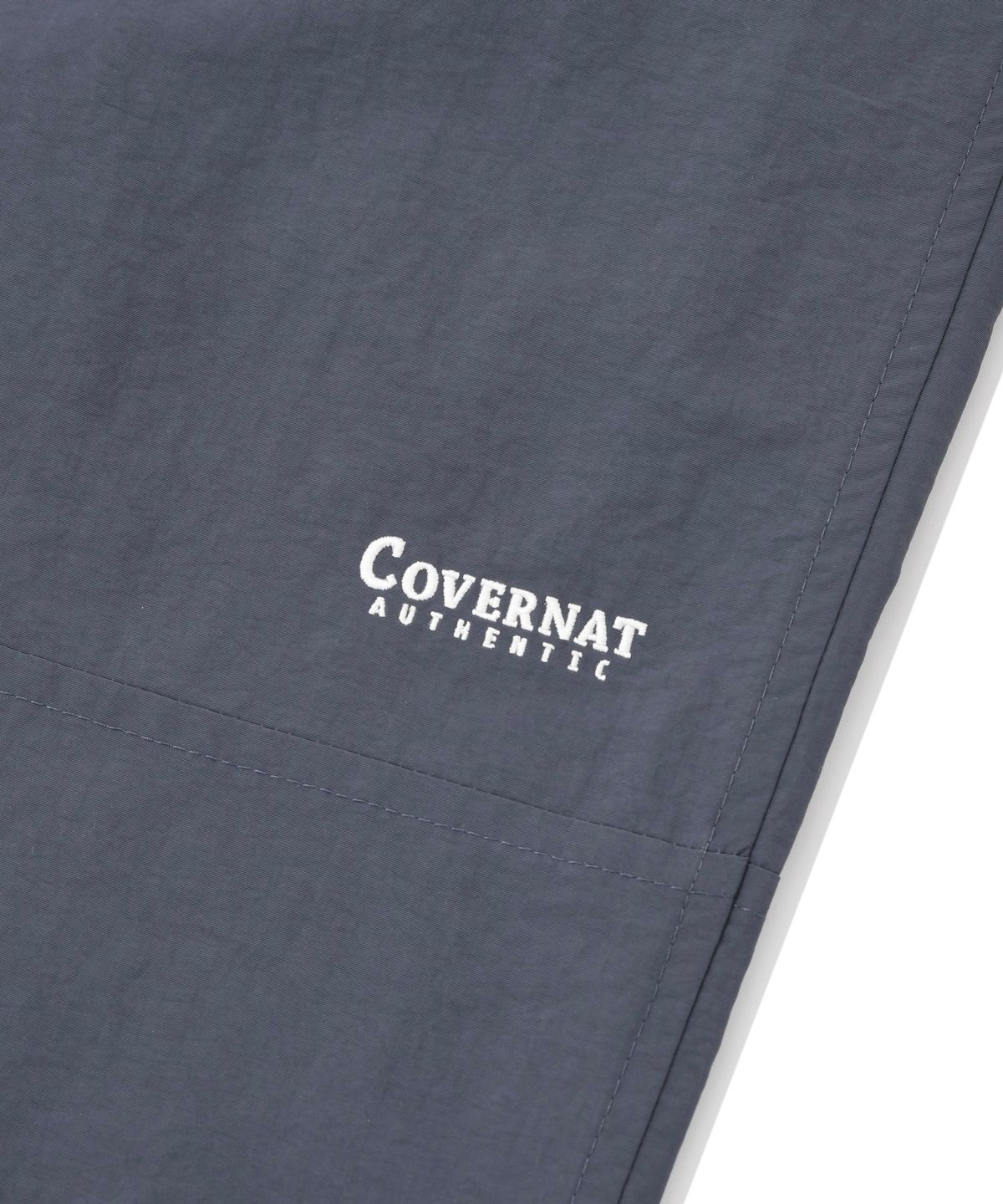 커버낫(COVERNAT) 윈드브레이커 조거 팬츠 네이비