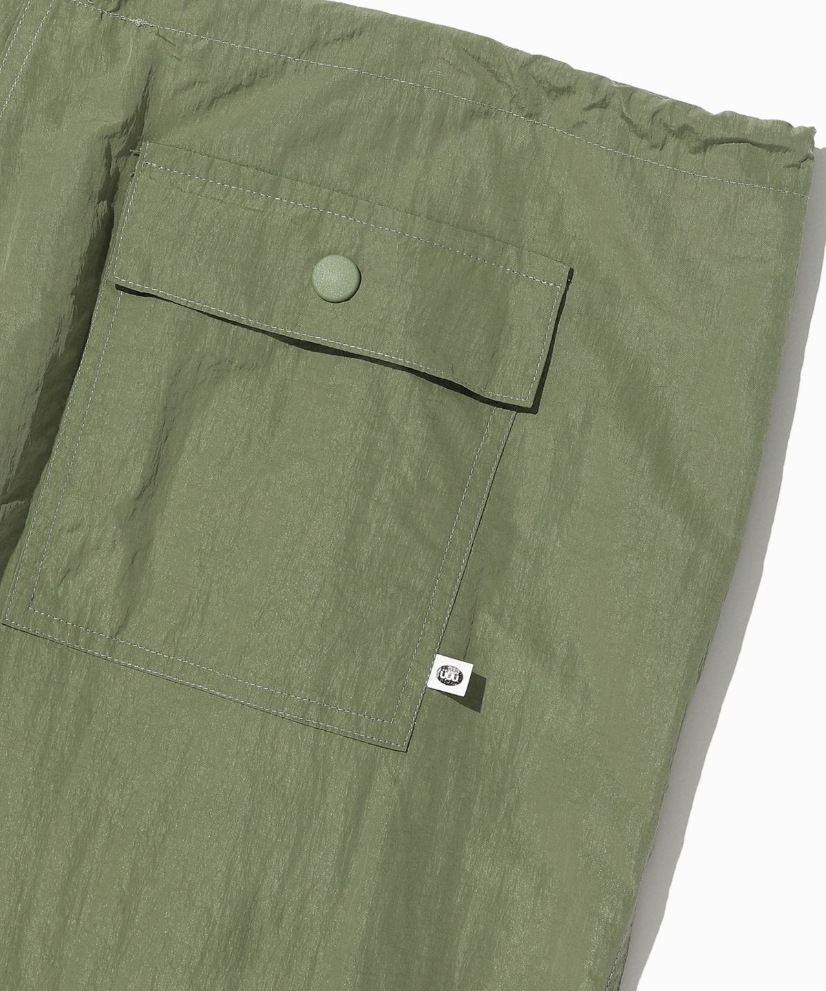 이스트쿤스트(ISTKUNST) LOWRISE PARACHUTE PANTS_KHAKI(IK2DMMPA11A)