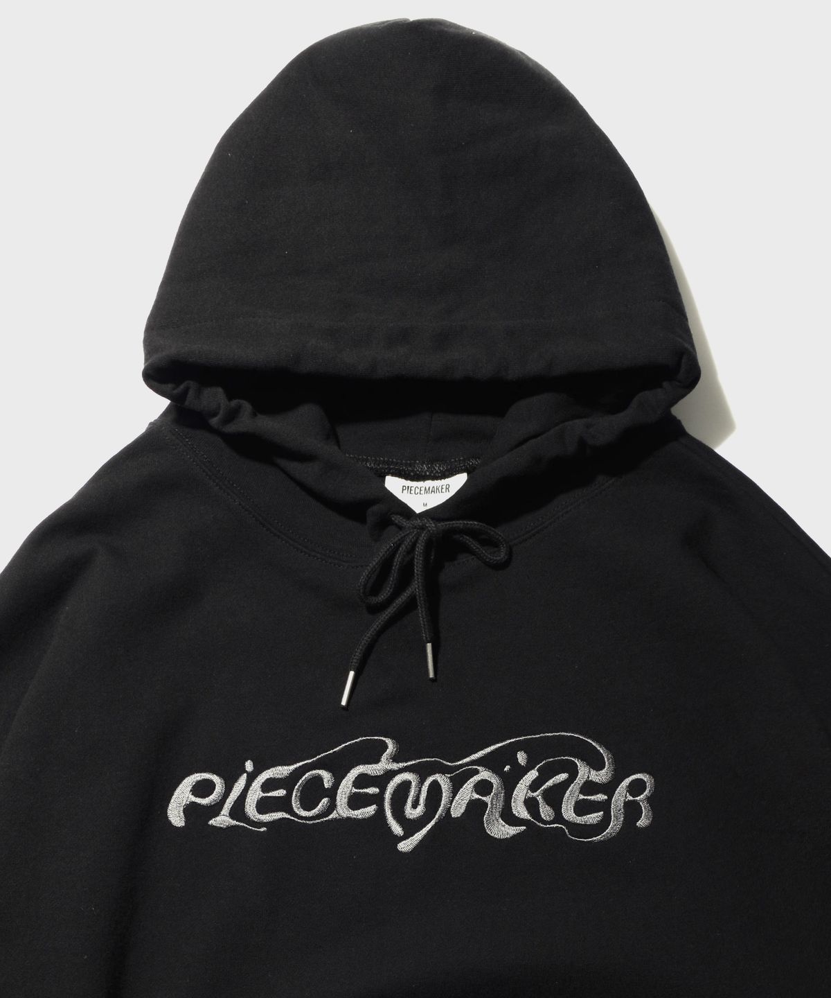 피스메이커(PIECE MAKER) ETHNIC LOGO HOODIE (BLACK)