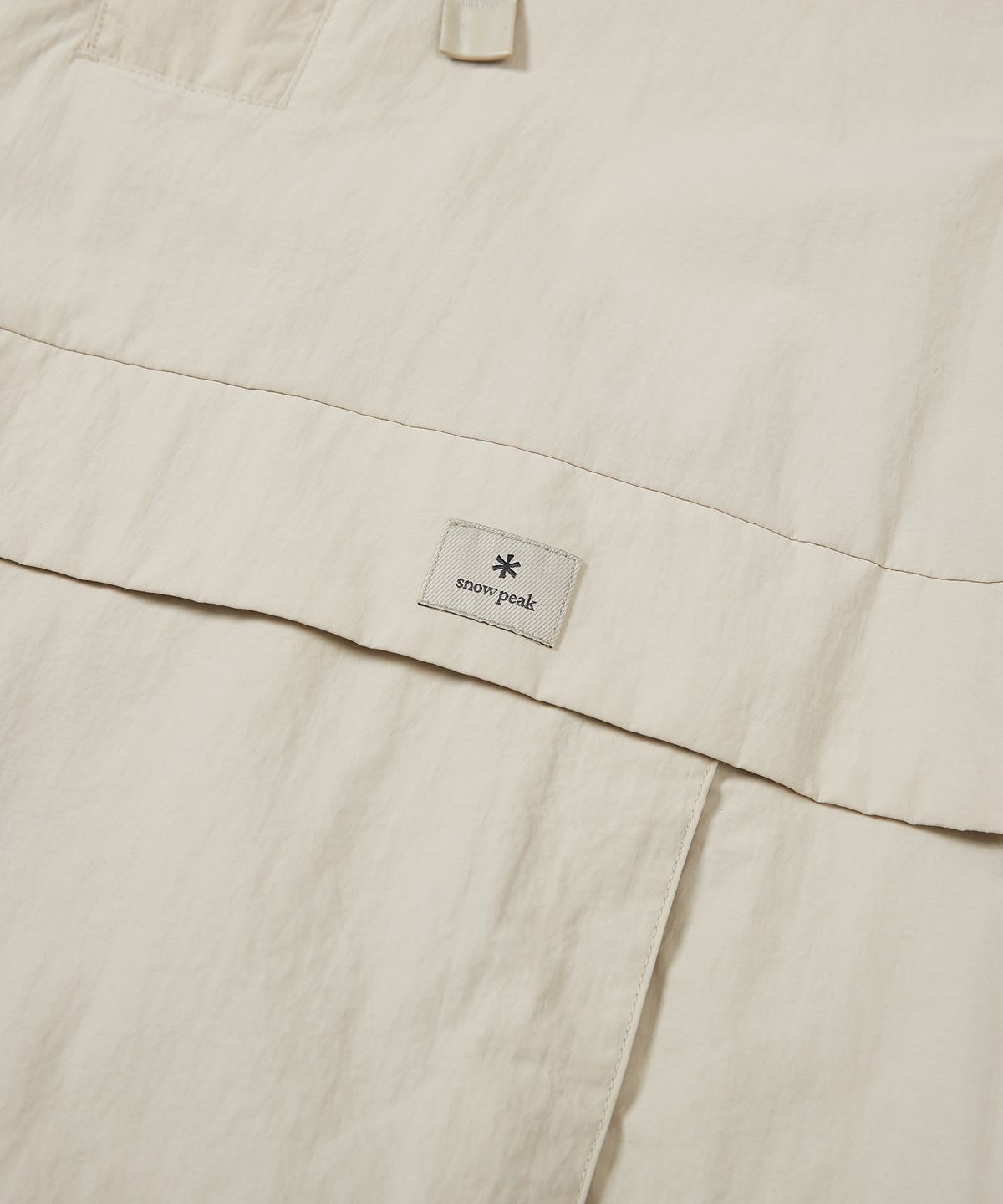 스노우피크 어패럴(SNOWPEAK APPAREL) 캠플 아노락 Beige (S23SUCAN42)