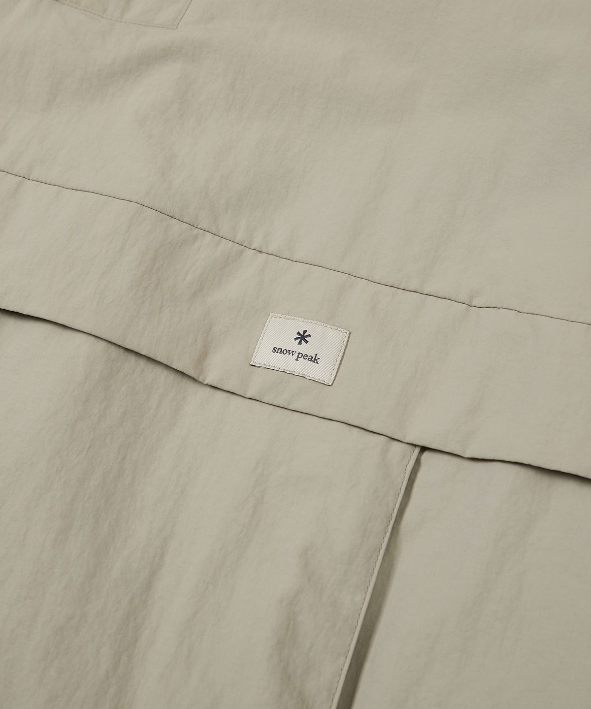 스노우피크 어패럴(SNOWPEAK APPAREL) 캠플 아노락 Teal Khaki (S23SUCAN42)
