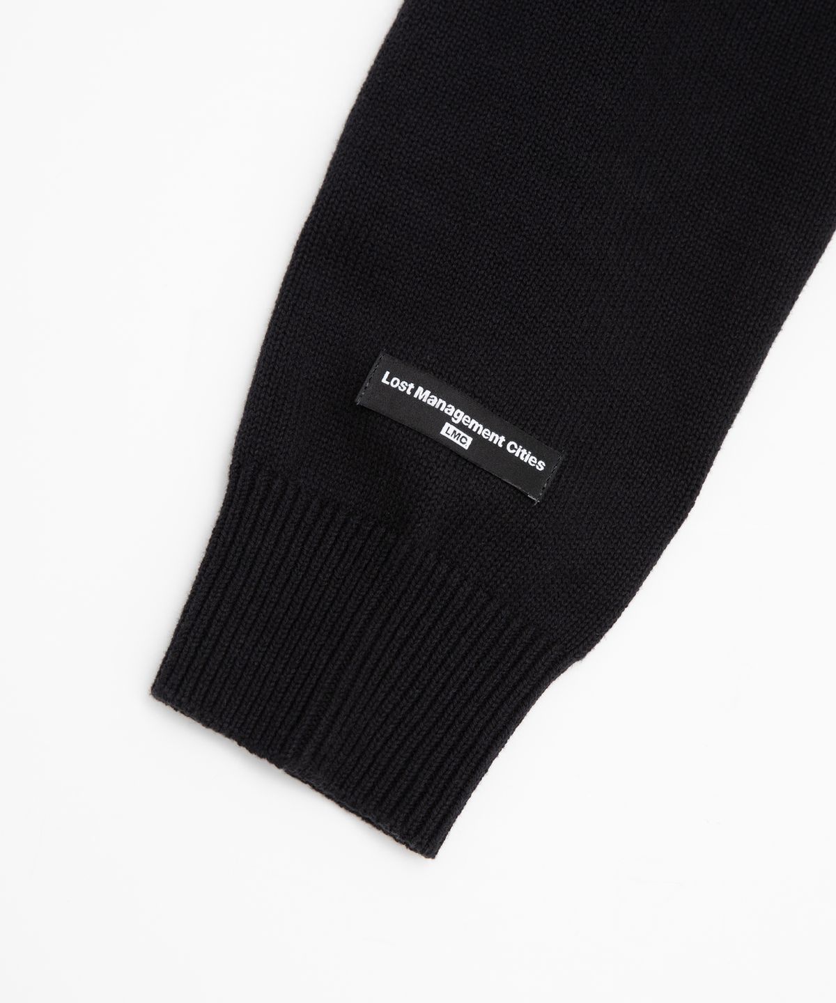 엘엠씨(LMC) SPIRAL KNIT SWEATER black