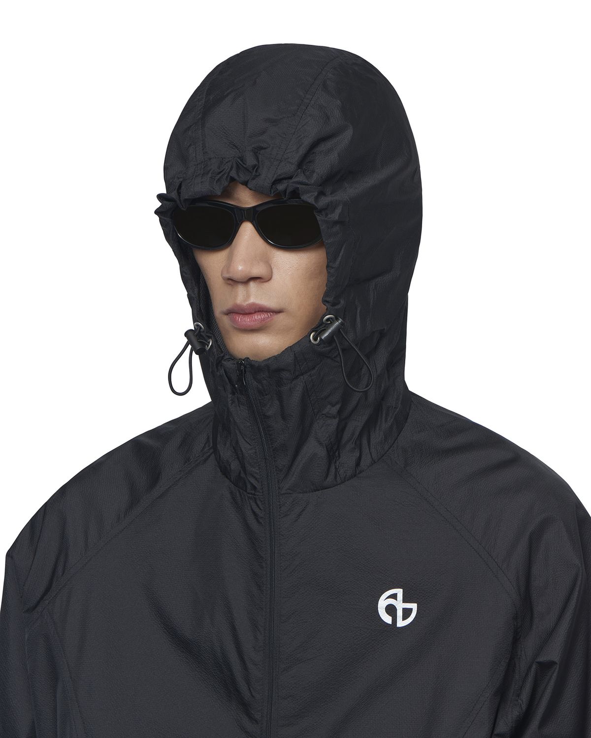 노매뉴얼(NOMANUAL) TRANSLUCENT HOODED JACKET - BLACK